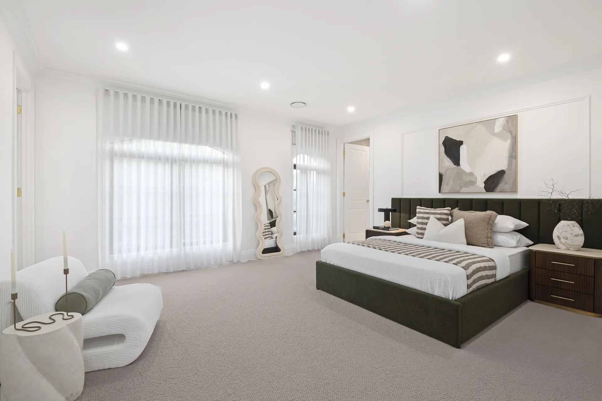 Master suite finished with plush wool carpet.