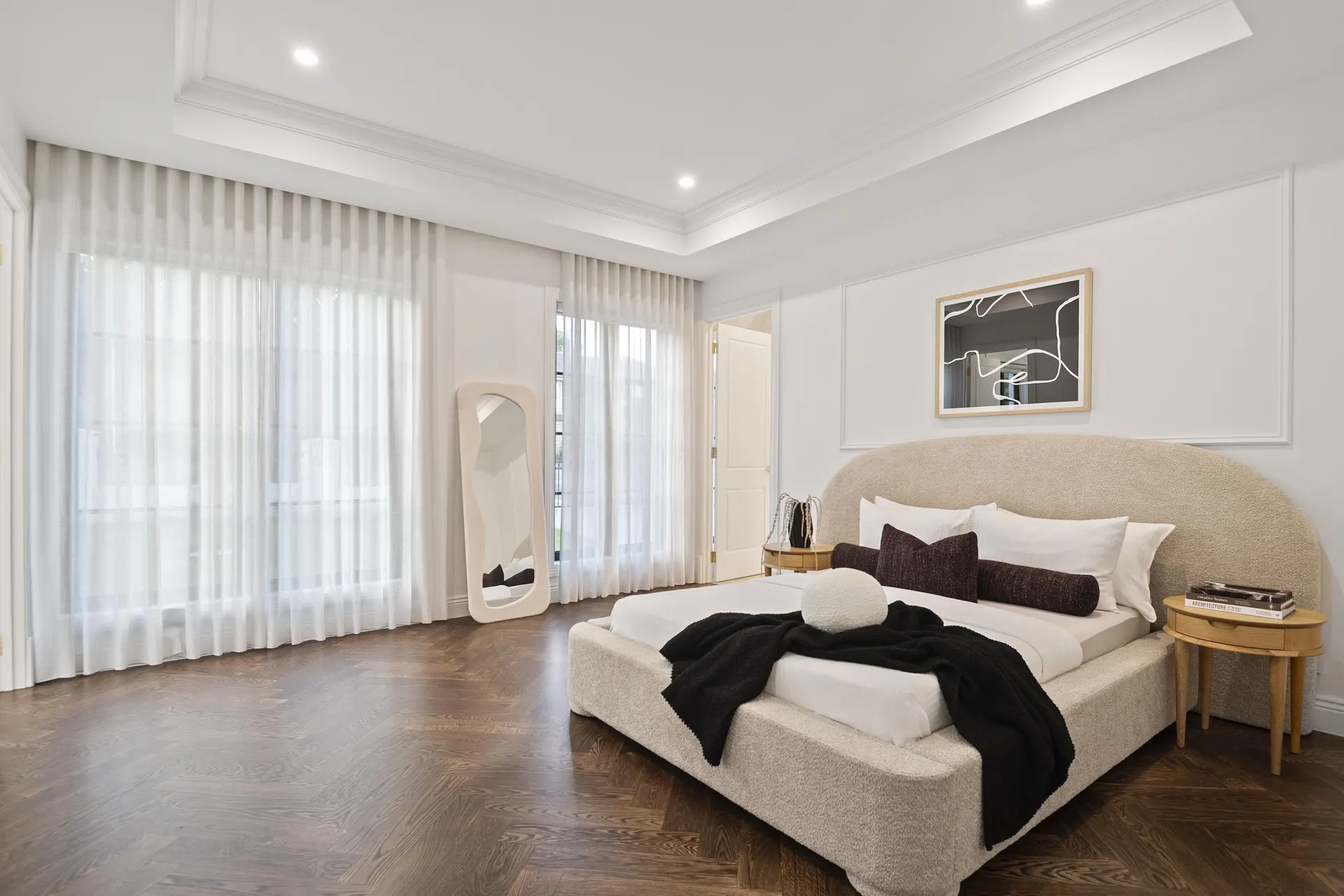 Main bedroom with dark engineered oak herringbone flooring